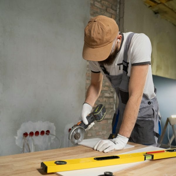 Worker preparing a facility for licensing and permits – representing compliance requirements for starting a childcare center in Florida.